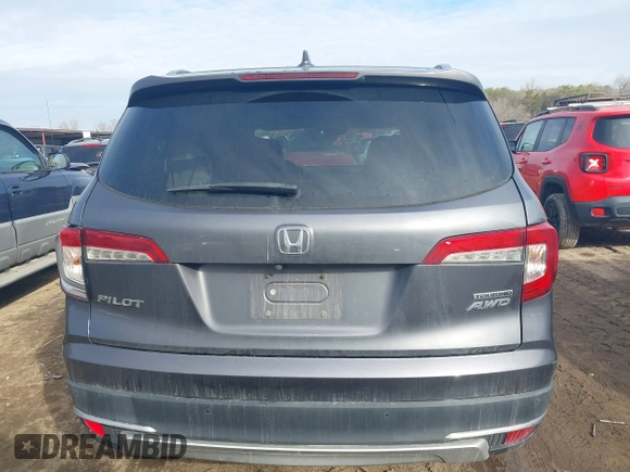 2019 Honda Pilot Touring 7-Passenger with VIN 5FNYF6H67KB018769, listed as a IAAI auction lot 41310452 with 92,499 mi miles. Bid and sale history available at carsss.com. Image 15.