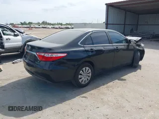 2015 Toyota Camry XLE with VIN 4T1BF1FK7FU037419, listed as a IAAI auction lot 42053259 with 118,453 mi miles and . Bid and sale history available at DreamBid. Image 4.
