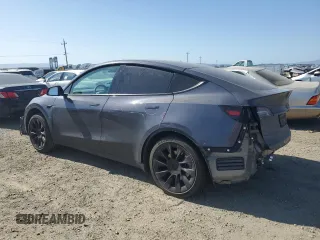 2022 Tesla Model Y Long Range z VIN 7SAYGDEE6NF429701, wystawiony jako Copart lot #58585665 z przebiegiem 86 537 mil mil oraz Szkoda całkowita • Salvage title. Historia ofert i sprzedaży dostępna na DreamBid. Obrazek 2.