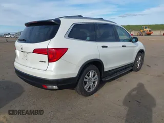 2016 Honda Pilot LX with VIN 5FNYF6H1XGB009768, listed as a IAAI auction lot 41666109 with 137,733 mi miles. Bid and sale history available at carsss.com. Image 4.