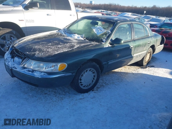1998 Lincoln Continental with VIN 1LNFM97V4WY713283, listed as a IAAI auction lot 41264918 with 89,134 mi miles. Bid and sale history available at carsss.com. Image 2.