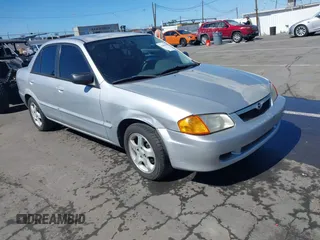 2000 Mazda Protege ES with VIN JM1BJ2218Y0283251, listed as a IAAI auction lot 41665289 with 141,336 mi miles and . Bid and sale history available at DreamBid. Image 1.