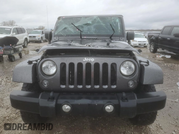 2014 Jeep Wrangler Rubicon with VIN 1C4BJWCG9EL189819, listed as a Copart auction lot 80522204 with 82,083 mi miles and Salvage title. Bid and sale history available at DreamBid. Image 5.
