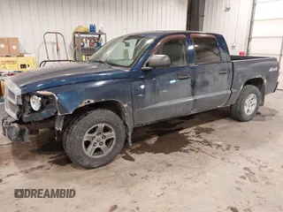 2006 Dodge Dakota SLT with VIN 1D7HW48N16S710729, listed as a IAAI auction lot 41568772 with 133,078 mi miles. Bid and sale history available at carsss.com. Image 2.