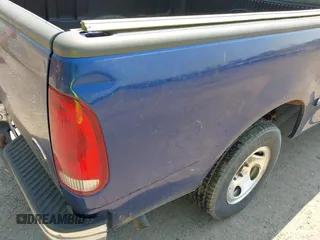 1998 Ford F-150 z VIN 2FTZX1727WCA55840, wystawiony jako IAAI lot #42437567 z przebiegiem 173 975 mil mil oraz . Historia ofert i sprzedaży dostępna na DreamBid. Obrazek 6.