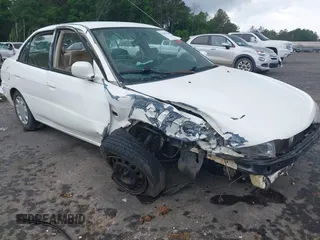 1999 Mitsubishi Mirage z VIN JA3AY36C2XU019134, wystawiony jako IAAI lot #42077649 z przebiegiem 304 426 mil mil oraz . Historia ofert i sprzedaży dostępna na DreamBid. Obrazek 1.