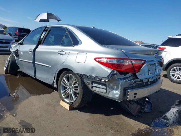 2015 Toyota Camry Hybrid LE with VIN 4T1BD1FK5FU161257, listed as a IAAI auction lot 41759927 with 116,853 mi miles. Bid and sale history available at carsss.com. Image 3.