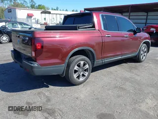 2019 Honda Ridgeline RTL-E with VIN 5FPYK3F72KB024461, listed as a IAAI auction lot 41813568 with 122,364 mi miles and . Bid and sale history available at DreamBid. Image 4.
