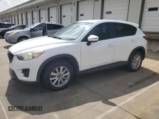 2016 Mazda CX-5 Sport with VIN JM3KE4BY1G0829875, listed as a Copart auction lot 65043285 with 102,267 mi miles and Clean title. Bid and sale history available at DreamBid. Image 1.