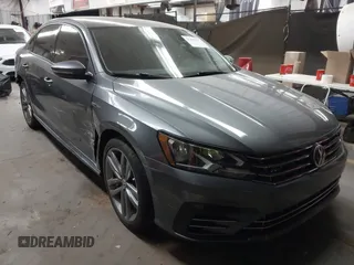 2018 Volkswagen Passat 2.0T S with VIN 1VWAA7A33JC045157, listed as a IAAI auction lot 41467197 with 65,621 mi miles. Bid and sale history available at carsss.com. Image 1.