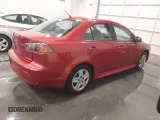 2015 Mitsubishi Lancer ES with VIN JA32U2FU0FU014418, listed as a IAAI auction lot 41489892 with 55,599 mi miles. Bid and sale history available at carsss.com. Image 4.