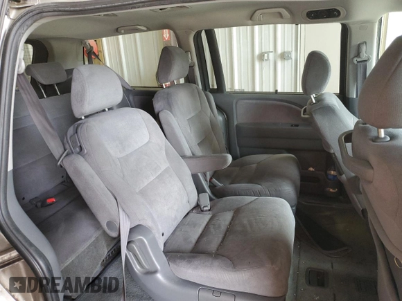 2007 Honda Odyssey EX with VIN 5FNRL38477B429624, listed as a Copart auction lot 53961825 with 144,957 mi miles and Salvage Title. Bid and sale history available at DreamBid. Image 11.