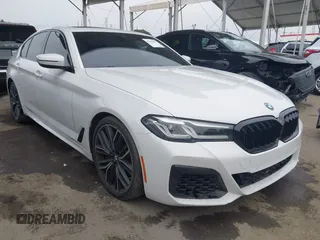 2021 BMW 5 Series 540i with VIN WBA53BJ00MWW90243, listed as a IAAI auction lot 42180493 with 83,447 mi miles and . Bid and sale history available at DreamBid. Image 1.