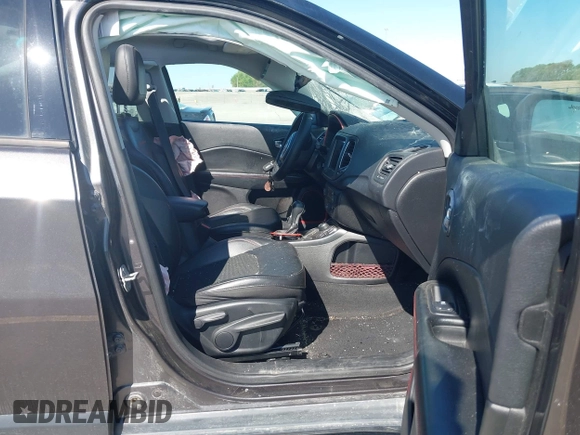2019 Jeep Compass Trailhawk with VIN 3C4NJDDB0KT619337, listed as a IAAI auction lot 42171160 with 63,869 mi miles and . Bid and sale history available at DreamBid. Image 5.