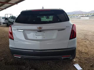 2021 Cadillac XT5 FWD Premium Luxury with VIN 1GYKNCRS5MZ224957, listed as a IAAI auction lot 41794648 with 28,540 mi miles and . Bid and sale history available at carsss.com. Image 16.