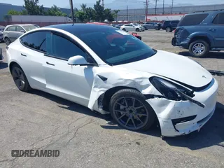 2023 Tesla Model 3 with VIN 5YJ3E1EA0PF621448, listed as a IAAI auction lot 42500155 with 26,589 mi miles and . Bid and sale history available at DreamBid. Image 1.
