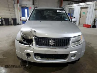 2006 Suzuki Grand Vitara Premium z VIN JS3TD943164103120, wystawiony jako Copart lot #56132585 z przebiegiem 143 313 mil mil oraz Szkoda całkowita • Salvage title. Historia ofert i sprzedaży dostępna na DreamBid. Obrazek 5.