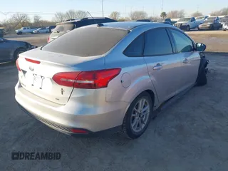 2017 Ford Focus SE with VIN 1FADP3F23HL324633, listed as a IAAI auction lot 41719626 with 84,851 mi miles. Bid and sale history available at carsss.com. Image 4.