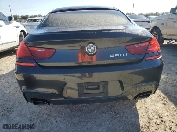 2015 BMW 6 Series 650i with VIN WBA6B2C58FD799063, listed as a Copart auction lot 77819914 with 0 mi miles and Salvage Title. Bid and sale history available at carsss.com. Image 6.