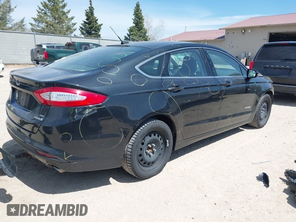 2014 Ford Fusion SE Hybrid with VIN 3FA6P0LU6ER312678, listed as a IAAI auction lot 42140117 with 103,154 mi miles. Bid and sale history available at carsss.com. Image 4.