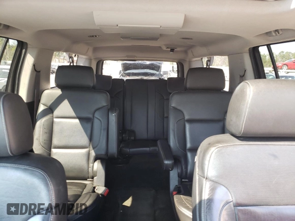 2015 Chevrolet Suburban LTZ with VIN 1GNSKKKC2FR210780, listed as a Copart auction lot 47207445 with 163,448 mi miles and Salvage Title. Bid and sale history available at carsss.com. Image 10.
