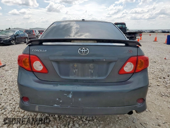 2010 Toyota Corolla z VIN 2T1BU4EE2AC497519, wystawiony jako Copart lot #64614915 z przebiegiem 183 890 mil mil oraz Szkoda całkowita • Salvage title. Historia ofert i sprzedaży dostępna na DreamBid. Obrazek 6.