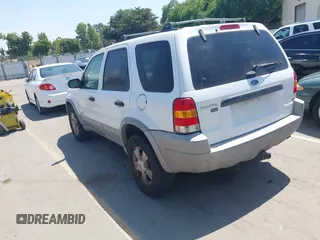 2001 Ford Escape XLT with VIN 1FMYU04131KB70753, listed as a IAAI auction lot 42174549 with 209,485 mi miles and . Bid and sale history available at DreamBid. Image 3.