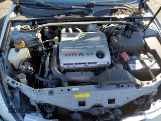 2005 Toyota Solara SE with VIN 4T1CA38PX5U060943, listed as a Copart auction lot 69124204 with 71,069 mi miles and Salvage Title. Bid and sale history available at DreamBid. Image 12.