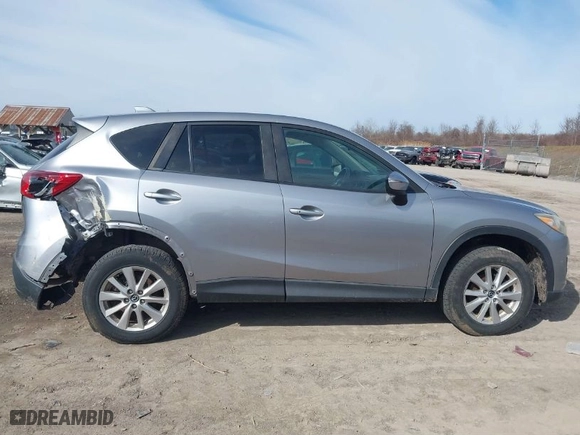 2015 Mazda CX-5 Touring with VIN JM3KE4CY0F0503353, listed as a IAAI auction lot 41815416 with 95,410 mi miles. Bid and sale history available at carsss.com. Image 14.