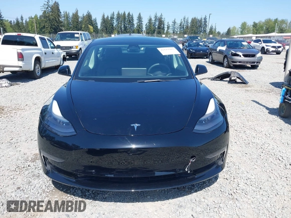 2022 Tesla Model 3 Long Range with VIN 5YJ3E1EB7NF241996, listed as a IAAI auction lot 42115915 with 23,433 mi miles and . Bid and sale history available at DreamBid. Image 12.