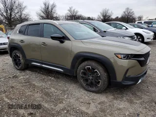2023 Mazda CX-50 2.5 Turbo with VIN 7MMVABXY6PN137936, listed as a Copart auction lot 82888874 with Not provided miles and Salvage title. Bid and sale history available at DreamBid. Image 4.