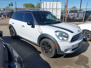 2015 MINI Countryman with VIN WMWZB3C51FWR45357, listed as a IAAI auction lot 41871831 with 201,358 mi miles and . Bid and sale history available at DreamBid. Image 1.