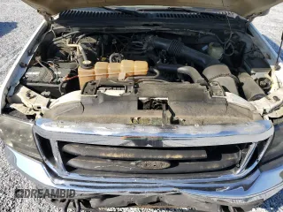 2004 Ford F-250 XL с VIN 1FTNW21L34EB63260, выставлен на аукционе Copart как лот 51677835 с пробегом Не указан миль и Списание • Salvage title. История ставок и продаж доступна на DreamBid. Изображение 13.
