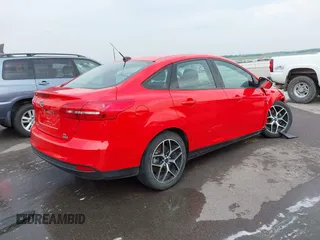 2017 Ford Focus SE with VIN 1FADP3FE9HL222795, listed as a IAAI auction lot 42425996 with 90,724 mi miles and . Bid and sale history available at DreamBid. Image 4.