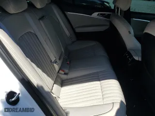2023 Genesis G70 2.0T with VIN KMTG34TA2PU121330, listed as a Copart auction lot 55718144 with 19,599 mi miles and Salvage Title. Bid and sale history available at carsss.com. Image 11.