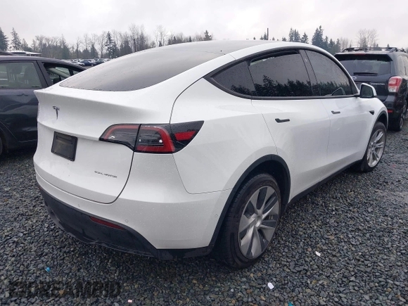 2022 Tesla Model Y Long Range z VIN 7SAYGDEE6NF451259, wystawiony jako IAAI lot #41200775 z przebiegiem 59 683 mil mil oraz . Historia ofert i sprzedaży dostępna na DreamBid. Obrazek 4.