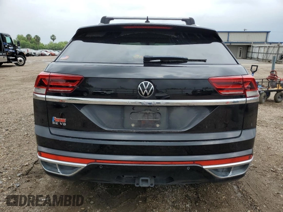 2021 Volkswagen Atlas SE with VIN 1V2PE2CA4MC208319, listed as a Copart auction lot 52038335 with 58,322 mi miles and Salvage title. Bid and sale history available at DreamBid. Image 6.