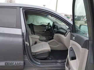 2021 Hyundai Tucson SE with VIN KM8J23A40MU299596, listed as a IAAI auction lot 41513198 with 54,284 mi miles and . Bid and sale history available at DreamBid. Image 5.