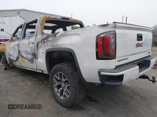2017 GMC Sierra 1500 SLT z VIN 3GTU2NEC0HG382405, wystawiony jako IAAI lot #41300588 z przebiegiem Nie podano mil oraz . Historia ofert i sprzedaży dostępna na DreamBid. Obrazek 3.