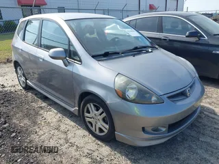 2008 Honda Fit Sport with VIN JHMGD386X8S058659, listed as a IAAI auction lot 42168584 with 210,589 mi miles. Bid and sale history available at carsss.com. Image 1.