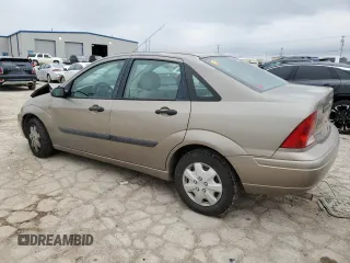 2003 Ford Focus LX with VIN 1FAFP33P73W114861, listed as a Copart auction lot 44859405 with 100,574 mi miles and Salvage Title. Bid and sale history available at carsss.com. Image 2.