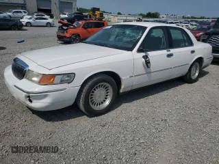 2002 Mercury Grand Marquis LS Premium z VIN 2MEFM75W52X666147, wystawiony jako Copart lot #58970815 z przebiegiem 133 495 mil mil oraz Szkoda całkowita • Salvage title. Historia ofert i sprzedaży dostępna na DreamBid. Obrazek 1.