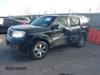 2012 Honda Pilot Touring with VIN 5FNYF4H93CB077057, listed as a IAAI auction lot 41156160 with 139,834 mi miles and . Bid and sale history available at DreamBid. Image 17.