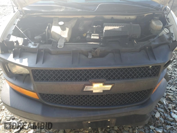 2017 Chevrolet Express Cargo z VIN 1GCWGAFF8H1111733, wystawiony jako Copart lot #55809425 z przebiegiem 99 328 mil mil oraz Szkoda całkowita • Salvage title. Historia ofert i sprzedaży dostępna na DreamBid. Obrazek 12.