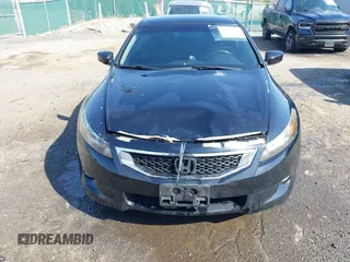 2009 Honda Accord LX-S with VIN 1HGCS12339A014004, listed as a IAAI auction lot 42042914 with 230,646 mi miles and . Bid and sale history available at DreamBid. Image 13.