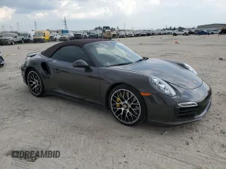 2015 Porsche 911 Turbo S with VIN WP0CD2A98FS178049, listed as a Copart auction lot 73181714 with 11,176 mi miles and Salvage Title. Bid and sale history available at carsss.com. Image 4.