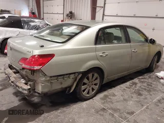 2006 Toyota Avalon XL with VIN 4T1BK36B16U062713, listed as a IAAI auction lot 41598608 with 142,598 mi miles. Bid and sale history available at carsss.com. Image 4.