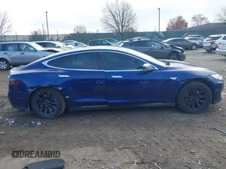 2016 Tesla Model S 90D with VIN 5YJSA1E21GF128362, listed as a IAAI auction lot 40891999 with 179,155 mi miles and . Bid and sale history available at DreamBid. Image 13.