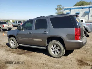 2013 GMC Yukon SLT with VIN 1GKS2CE02DR318091, listed as a Copart auction lot 70860184 with 127,879 mi miles and Salvage Title. Bid and sale history available at carsss.com. Image 2.