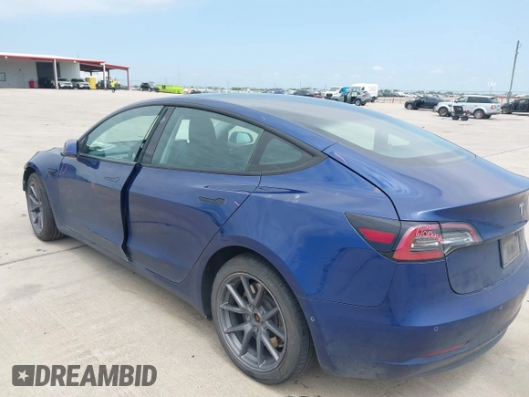 2022 Tesla Model 3 Long Range z VIN 5YJ3E1EB2NF246443, wystawiony jako IAAI lot #42179219 z przebiegiem Nie podano mil oraz . Historia ofert i sprzedaży dostępna na DreamBid. Obrazek 3.